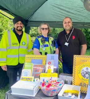 Volunteers at an outdoor stand