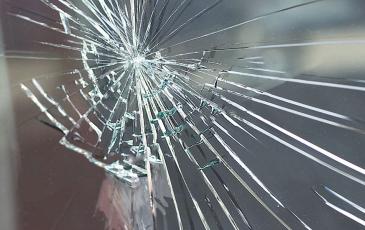 Image shows a broken window