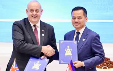 Lord Hanson with His Excellency Sar Sokha, Deputy Prime Minister of Cambodia and Minister of Interior, following the signing of the Memorandum of Understanding.
