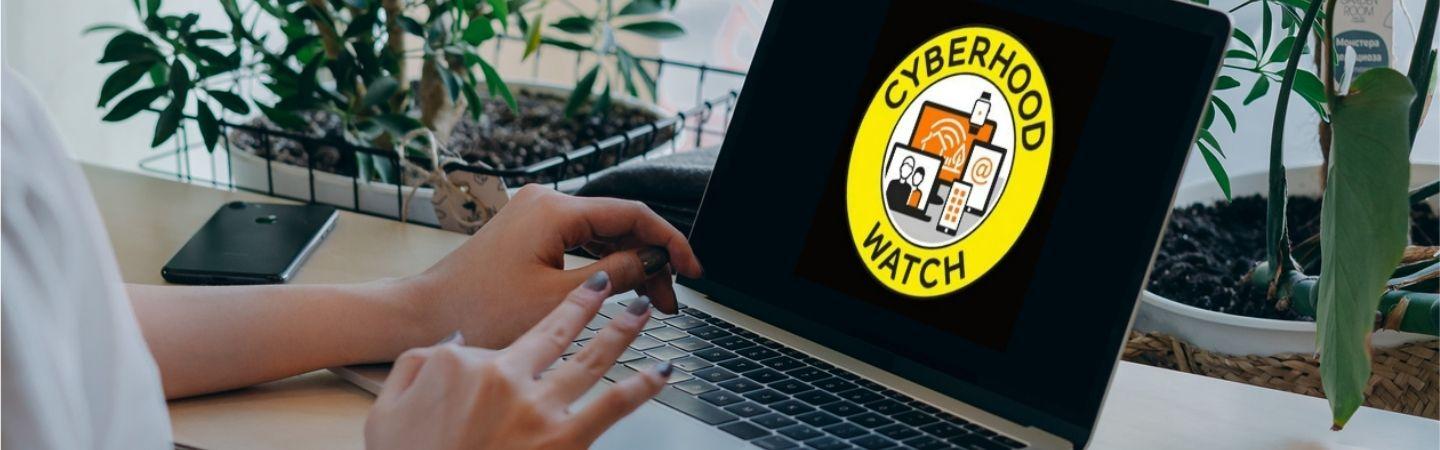 Image shows a computer with the Cyberhood Watch logo